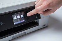 White inkjet printer with finger pointing to touchscreen - MFC-J895DW