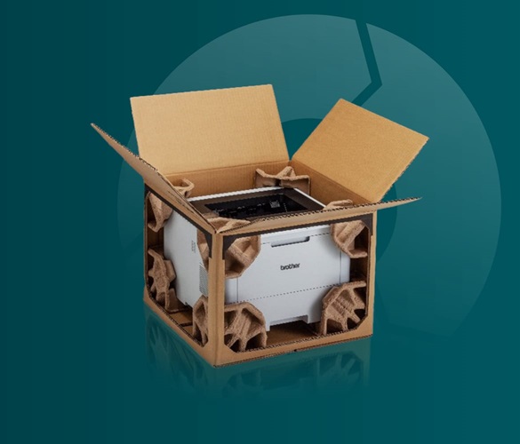 A Brother printer in a brown cardboard box, with cutouts exposing the inner packaging, on a teal background with circular process graphic