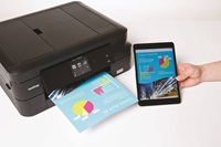 Person printing colour document on Brother printer from tablet computer