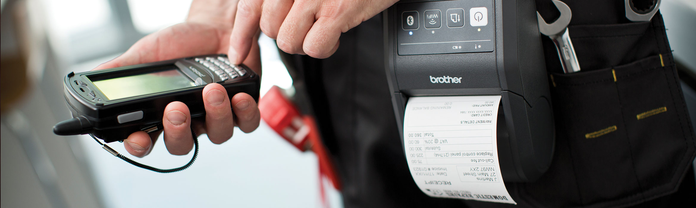 A utilities engineer printing from a mobile phone to a portable printer