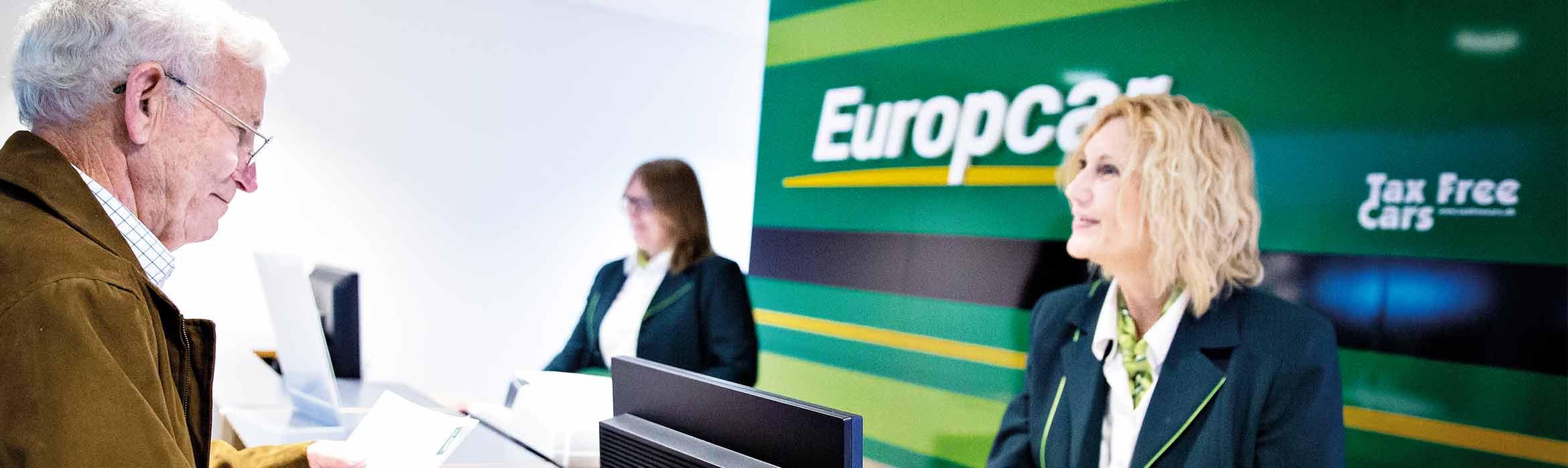 Europcar employee using Brother printer to help customer